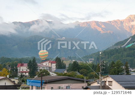 Hakuba, Nagano, Japan, Scenic view with mountains and hot air balloon Hakuba, Nagano, Japan, Scenic view with mountains and hot air balloon 129571646