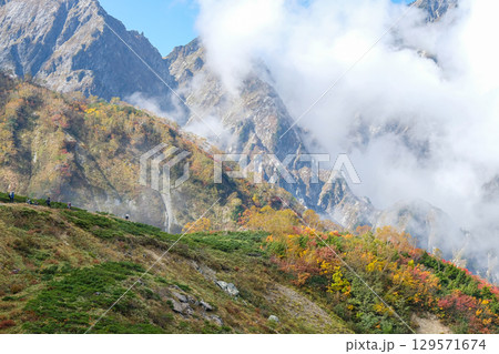 Happo Alpen Line Nature trail, Hakuba, Nagano, Japan, Mountain scenery with colorful foliage and clouds 129571674