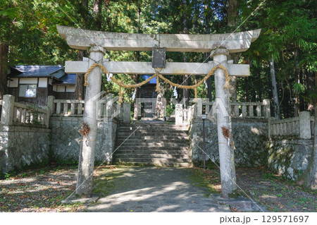 Hakuba, Nagano, Japan, Shinto shrine entrance gate in nature Hakuba, Nagano, Japan, Shinto shrine entrance gate in nature 129571697