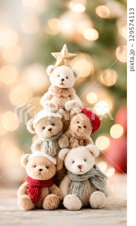 Christmas tree made of adorable teddy bears wearing winter scarves and hats, topped with a golden star, creating a festive holiday atmosphere 129574113
