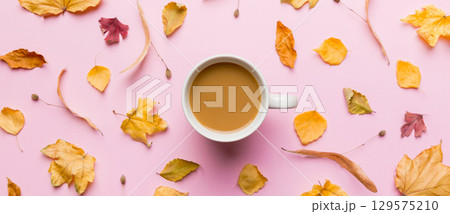Cup of cocoa with autumn leaves abstract still life top view vith copy space Cup of cocoa with autumn leaves abstract still life top view vith copy space 129575210