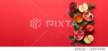Flat lay composition with symbols jewish Rosh Hashanah holiday attributes on colored background, Rosh hashanah concept. New Year holiday Traditional. Top view with copy space Flat lay composition with symbols jewish Rosh Hashanah holiday attributes on colored background, Rosh hashanah concept. New Year holiday Traditional. Top view with copy space 129575290