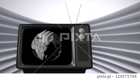 Image of vintage tv and globe on grey background Image of vintage tv and globe on grey background 129575799
