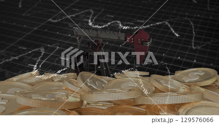 Image of financial data processing with graph over pumpjack with dooar coins on black background 129576066