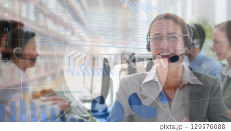 Image of statistics and data processing over businesswoman using phone headset Image of statistics and data processing over businesswoman using phone headset 129576088