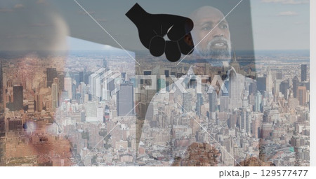 Image of hand icon over african american man in office and cityscape 129577477