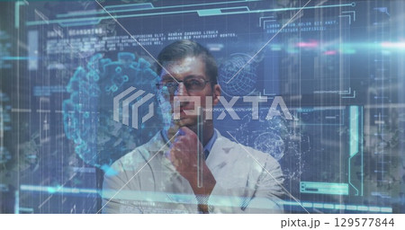 Image of data processing with virus cells over caucasian male doctor Image of data processing with virus cells over caucasian male doctor 129577844
