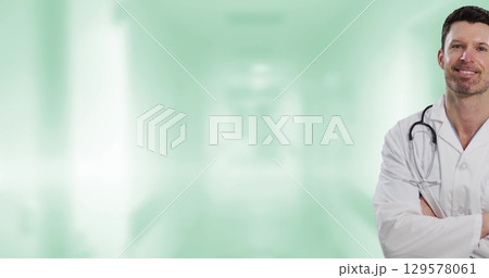 Image of caucasian male doctor over light spots 129578061