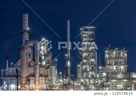 Oil and gas refinery plant at night, Global business energy logistic transportation, Oil and gas refinery petrochemical industrial, Petrochemical refinery industrial energy supply chain. 129578614