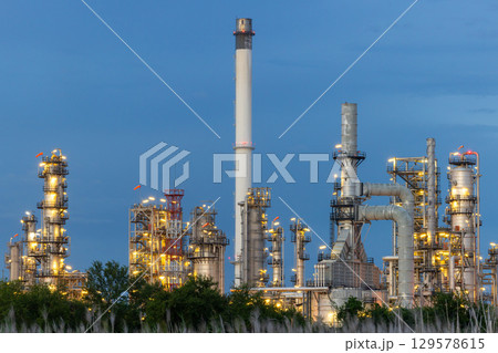 Oil and gas refinery plant at night, Global business energy logistic transportation, Oil and gas refinery petrochemical industrial, Petrochemical refinery industrial energy supply chain. Oil and gas refinery plant at night, Global business energy logistic transportation, Oil and gas refinery petrochemical industrial, Petrochemical refinery industrial energy supply chain. 129578615