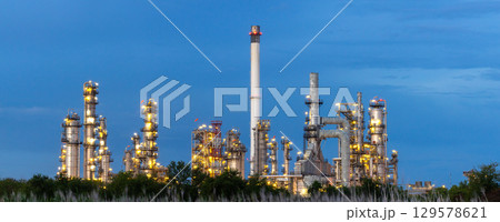 Oil and gas refinery plant at night, Global business energy logistic transportation, Oil and gas refinery petrochemical industrial, Petrochemical refinery industrial energy supply chain. Oil and gas refinery plant at night, Global business energy logistic transportation, Oil and gas refinery petrochemical industrial, Petrochemical refinery industrial energy supply chain. 129578621