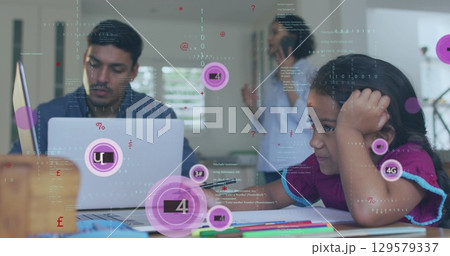 Image of network of connections with icons over diverse business people using computers 129579337