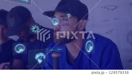 Image of digital screens with data over diverse men 129579338
