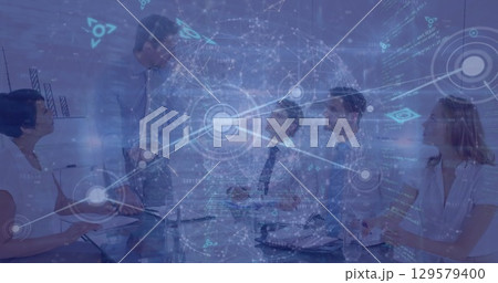 Image of rotating globe over caucasian coworkers discussing in meeting in boardroom 129579400