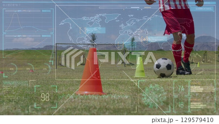 Image of interface with map and data over low section of player dribbling ball between cones 129579410