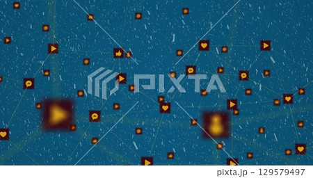 Image of network of connections with icons over snow falling on blue background Image of network of connections with icons over snow falling on blue background 129579497