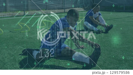 Image of scope and data processing over diverse male football players stretching in field 129579586