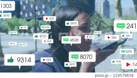 Social media icons and digital icons over increasing numbers against cityscape 129579656