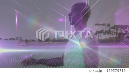 Image of shapes and light trails over african american man running Image of shapes and light trails over african american man running 129579713