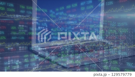 Displaying multicolored stock tickers fluctuating on trading floor with monitors and keyboards Displaying multicolored stock tickers fluctuating on trading floor with monitors and keyboards 129579779