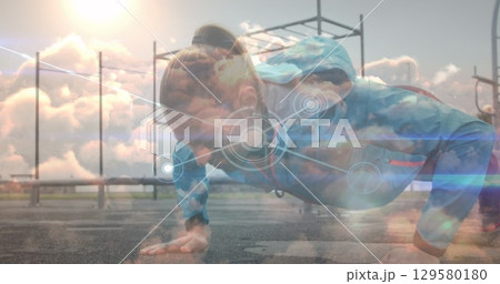 Image of network lines connecting dots, caucasian woman doing pushups at park Image of network lines connecting dots, caucasian woman doing pushups at park 129580180