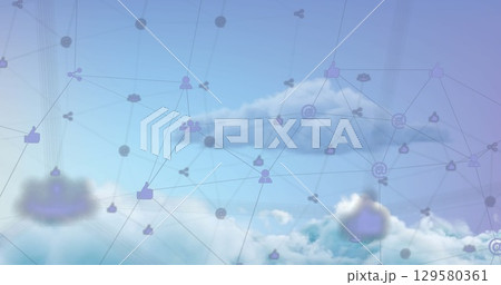 Image of network of digital icons against clouds in the blue sky 129580361