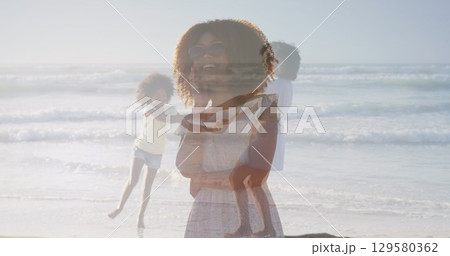 Digital composite image of caucasian female athlete running against sports field 129580362