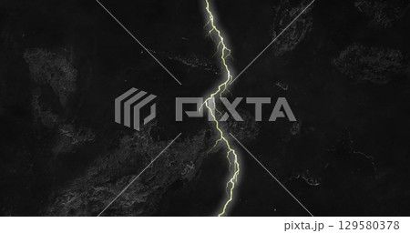 Image of yellow bolts of lightning white flashes in night sky Image of yellow bolts of lightning white flashes in night sky 129580378