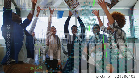 Showing portrait sheets, six business casual colleagues raising arms in modern office, with windows 129580403