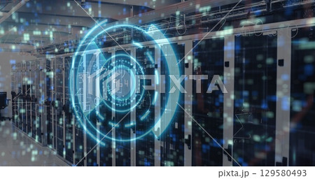 Floating glowing blue holographic display in data center, with server racks and LED indicators 129580493