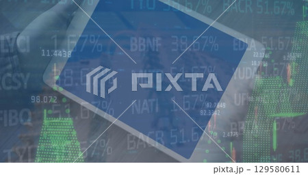 Image of stock market data processing against close up of a person holding digital tablet Image of stock market data processing against close up of a person holding digital tablet 129580611