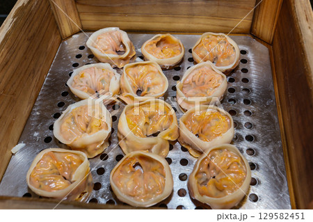 Korean traditional food. Kimchi steamed dumplings Korean traditional food. Kimchi steamed dumplings 129582451