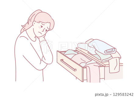 Confused girl look at clothes have nothing to wear Confused girl look at clothes have nothing to wear 129583242