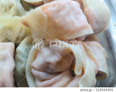 Asian traditional food. Korean style dumplings 129584365