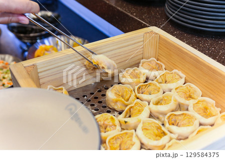 Asian traditional food. Korean style dumplings Asian traditional food. Korean style dumplings 129584375
