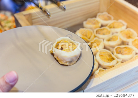 Asian traditional food. Korean style dumplings Asian traditional food. Korean style dumplings 129584377