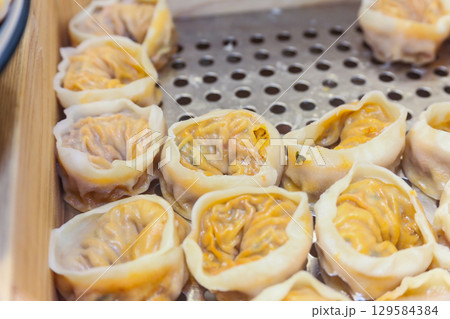 Asian traditional food. Korean style dumplings 129584384
