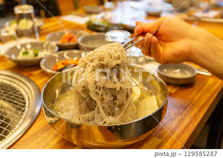 Korean traditional food. Cold buckwheat noodles 129585287