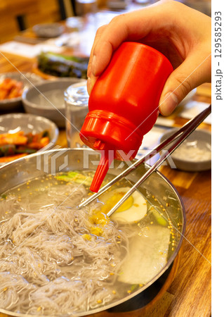 Korean traditional food. Cold buckwheat noodles 129585293