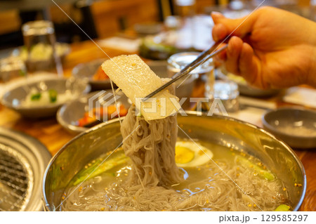 Korean traditional food. Cold buckwheat noodles Korean traditional food. Cold buckwheat noodles 129585297