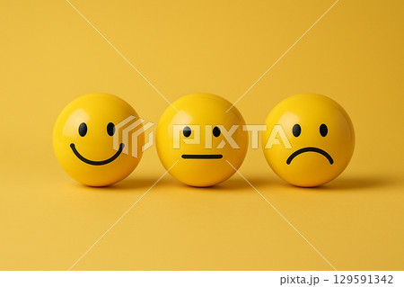 Brightly yellow colored smiley spheres closely grouped to showcase joy and solidarity in embracing diversity, inclusion, equity and feedback. Brightly yellow colored smiley spheres closely grouped to showcase joy and solidarity in embracing diversity, inclusion, equity and feedback. 129591342