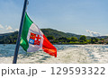 View of an Italian flag in Como lake, Italy. 129593322