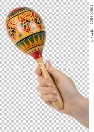 Hand with colorful wooden maraca with ethnic patterns, latin music instrument isolated on transparent background Hand with colorful wooden maraca with ethnic patterns, latin music instrument isolated on transparent background 129593865