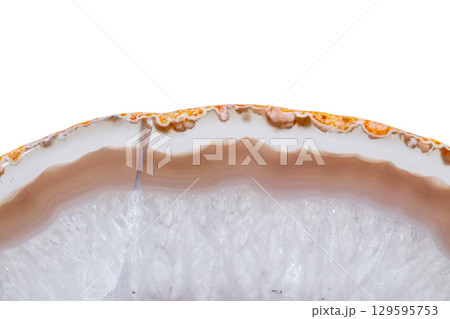 Macro mineral orange agate in crystals on white background Macro mineral orange agate in crystals on white background 129595753