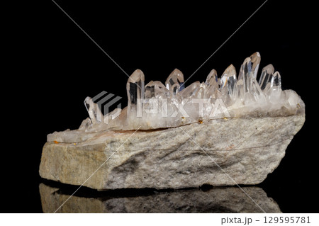 Macro Mineral Stone Rhinestone in Crystals on a Black Background Macro Mineral Stone Rhinestone in Crystals on a Black Background 129595781