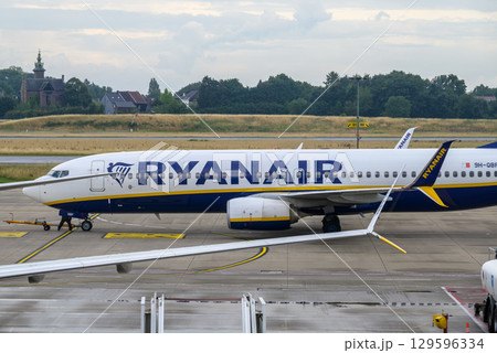Ryanair Irish ultra low-cost airline airplane on the tarmac of Brussels South Charleroi Airport in Charleroi, Belgium Ryanair Irish ultra low-cost airline airplane on the tarmac of Brussels South Charleroi Airport in Charleroi, Belgium 129596334