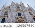 Church Milan Cathedral Duomo di Milano. Gothic architecture tourist attraction on piazza in Milan Lombardia Italy 129597640