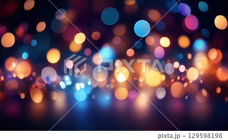 Colorful light bokeh effect on dark background radiating joy and positive vibes 129598198