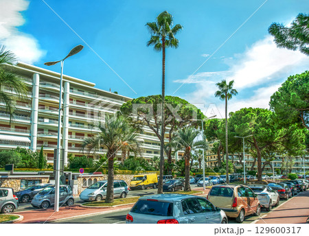 The amazing left side of the Croisette in Cannes with fantastic panoramic windows, palm trees and nightclubs 129600317