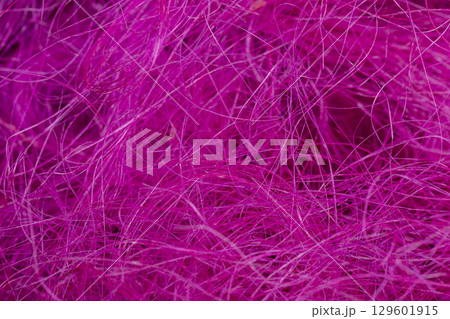 pink threads for creativity, artificial threads dyed red for decorative work and creative work of artisans 129601915
